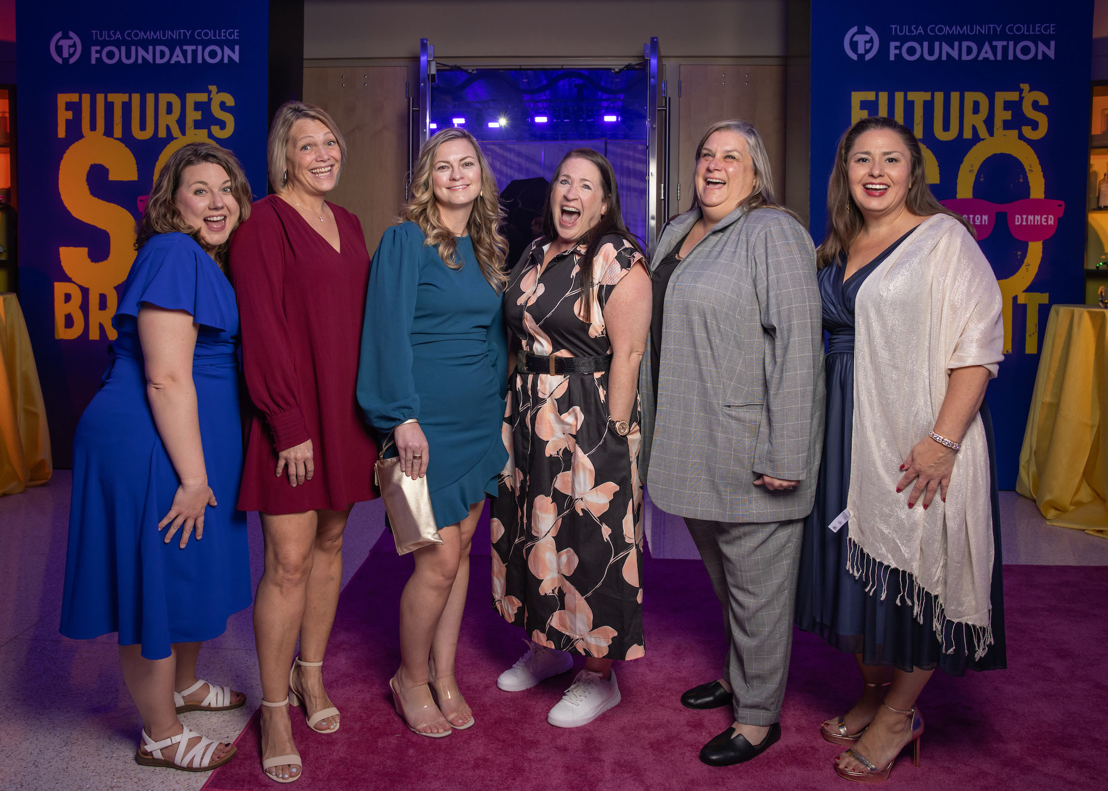 A group of TCC employee pose for a group photo.