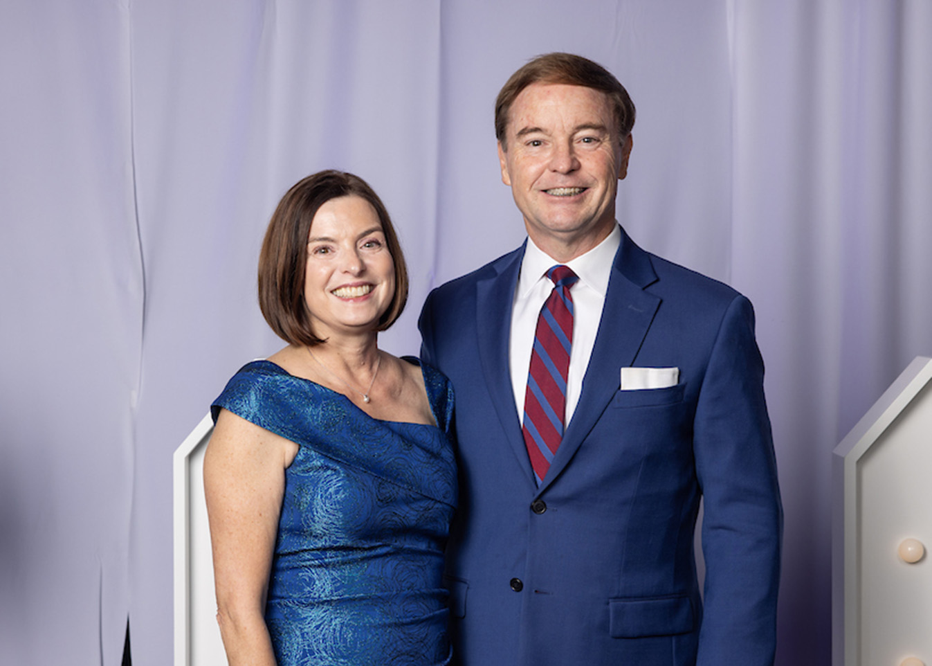 Roger Ramseyer is presented with a blue vase as a Vision Dinner 2025 Honoree.